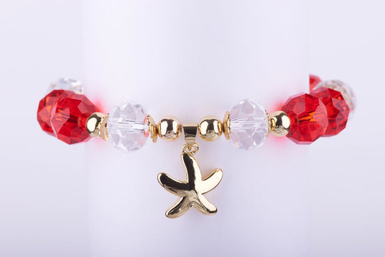 "Mermaidcore" (estética de sirena) sigue evolucionando hacia accesorios marinos elegantes. Úsalo.

Joyería de playa, accesorios para crucero, pulsera estrella de mar, starfish jewelry, summer vibes.