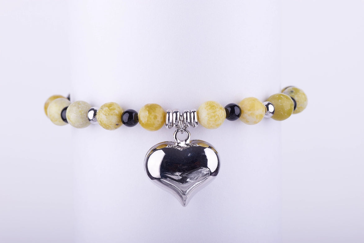 Estilo: Pulsera corazón plateado, Silver puffy heart jewelry, accesorios boho chic, pulsera piedras naturales.

Color: Joyería tonos tierra, accesorios color mostaza, pulsera otoño-invierno.