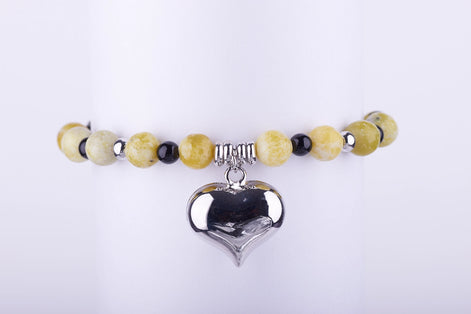 Estilo: Pulsera corazón plateado, Silver puffy heart jewelry, accesorios boho chic, pulsera piedras naturales.

Color: Joyería tonos tierra, accesorios color mostaza, pulsera otoño-invierno.