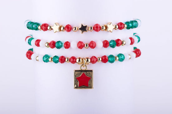 pulsera estrella navidad, joyería estrella roja, accesorios nochevieja, christmas star bracelet, regalo navidad mujer barato.
