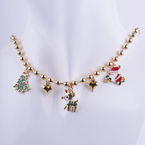 Collar gargantilla dorado con dijes esmaltados de Navidad: Santa Claus, Reno y Árbol Navideño. Joyería temática festiva.