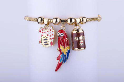 Pulsera Símbolos Venezolanos: Malta, Guacamaya y Arepa - Joyería Patriota