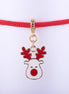 Pulsera de cordón rojo ajustable con dije de reno navideño esmaltado en blanco y rojo, con astas rojas y nariz roja, y detalles dorados.
